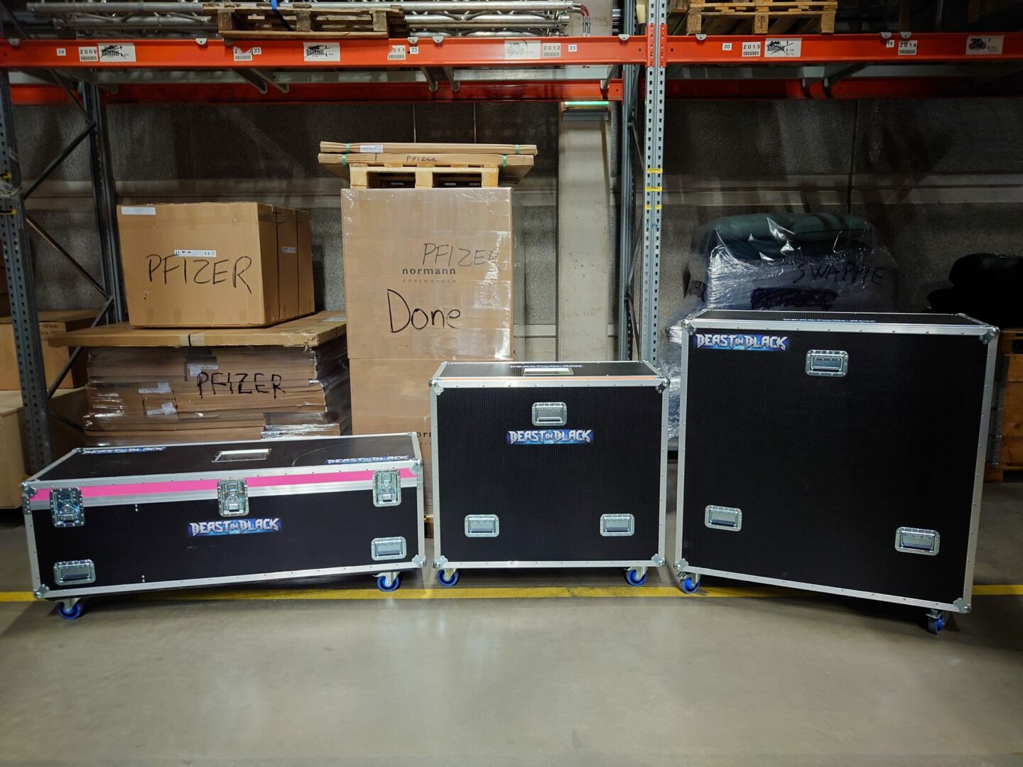 Three road ready flight cases for double bass drumset and accessories.